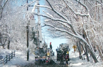 electrical workers in severe winter weather